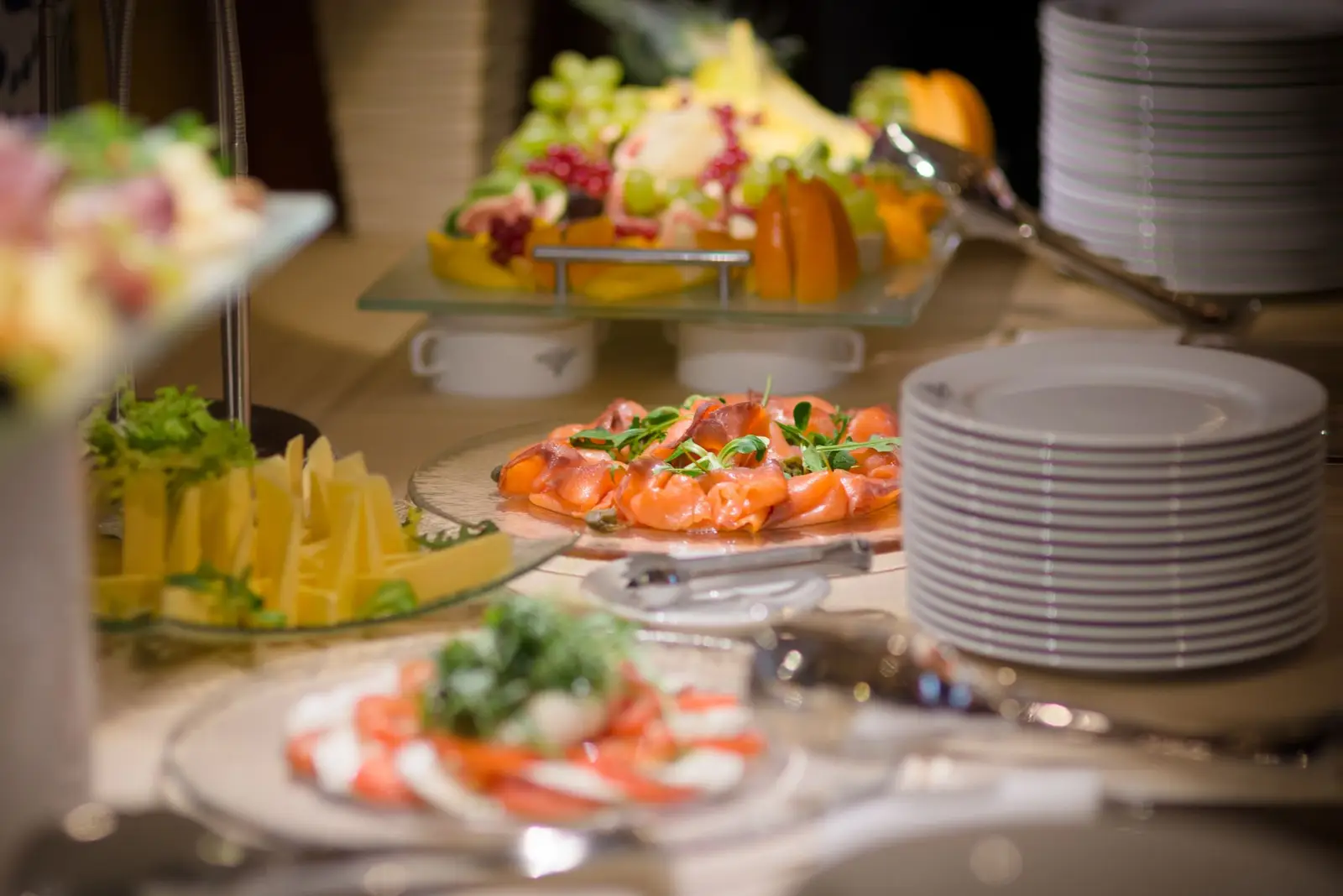 Buffet with salmon, fruit and salads