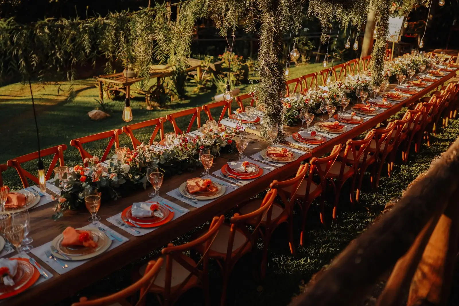 Long garden table set for a dinner